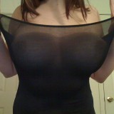 Kaylas huge round tits are visable through her tiny slutty sheer dress