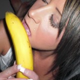 Sexy Monroe shows off her oral skills on a banana and then strips naked